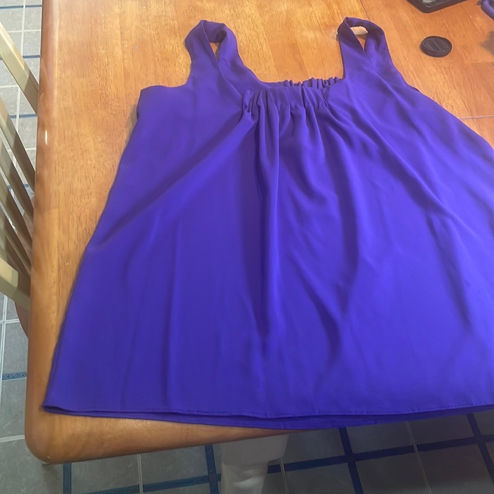 A purple casual dress top